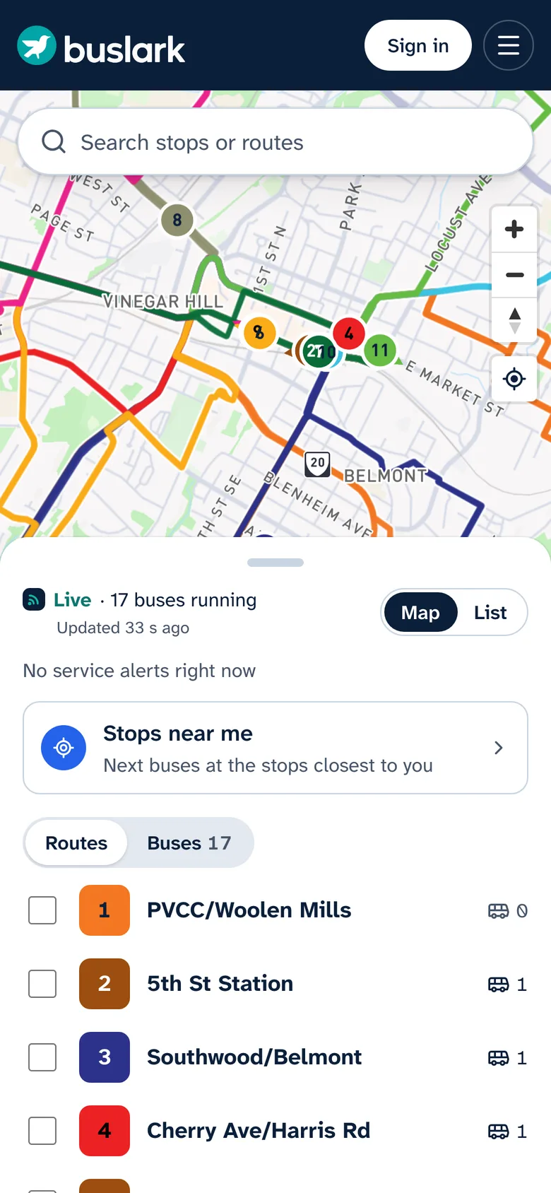 Bus Lark rider app on a phone: a live map of routes and buses, the number of buses running, Stops near me, and the route list.
